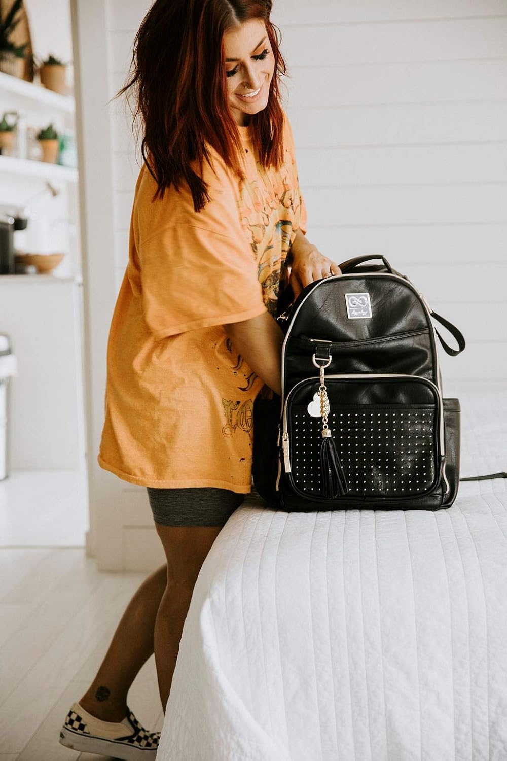 image:imageChelsea Cole For Itzy Ritzy Diaper Bag Backpack Large Capacity Boss Backpack Diaper Bag Includes Changing Pad Stroller Clips and Tassel Camo with Stag Head Print Interior and Black HardwareBlack With Gold Hardware