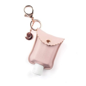 image:imageItzy Ritzy Hand Sanitizer Holder  Hand Sanitizer Case Keychain Fits 2Ounce Bottles of Sanitizers Not Included  Clips to Diaper Bag Purse or Travel Bag Blush