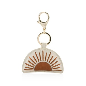 image:imageItzy Ritzy Puffy Diaper Bag Charm Purse Charm and Keychain  Vegan Leather Accessory Features A Durable Hinged Clasp and Modern Puffy Design  SunSun