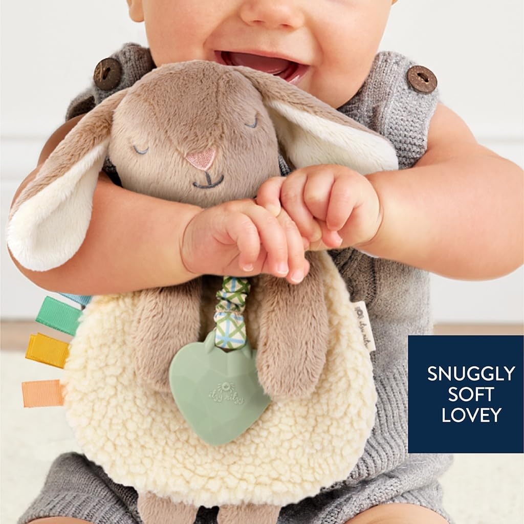 image:imageItzy Ritzy Itzy Lovey Including Teether Baby Lovey with Teether Textured Ribbons amp Dangle Arms Features Crinkle Sound Sherpa Fabric and Minky Plush BearTaupe Bunny