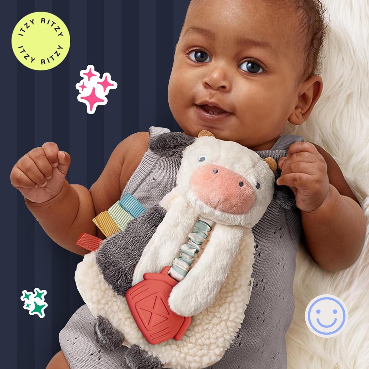 image:imageItzy Ritzy Itzy Lovey Including Teether Baby Lovey with Teether Textured Ribbons amp Dangle Arms Features Crinkle Sound Sherpa Fabric and Minky Plush BearCow