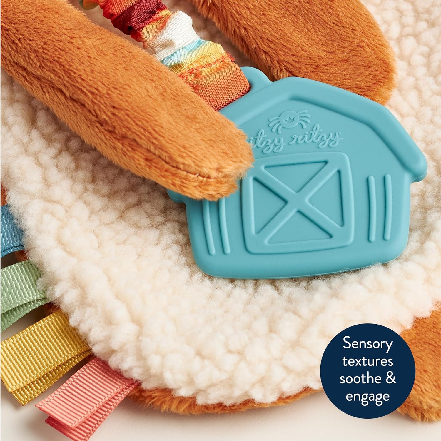 image:imageItzy Ritzy Itzy Lovey Including Teether Baby Lovey with Teether Textured Ribbons amp Dangle Arms Features Crinkle Sound Sherpa Fabric and Minky Plush BearHighland Cow