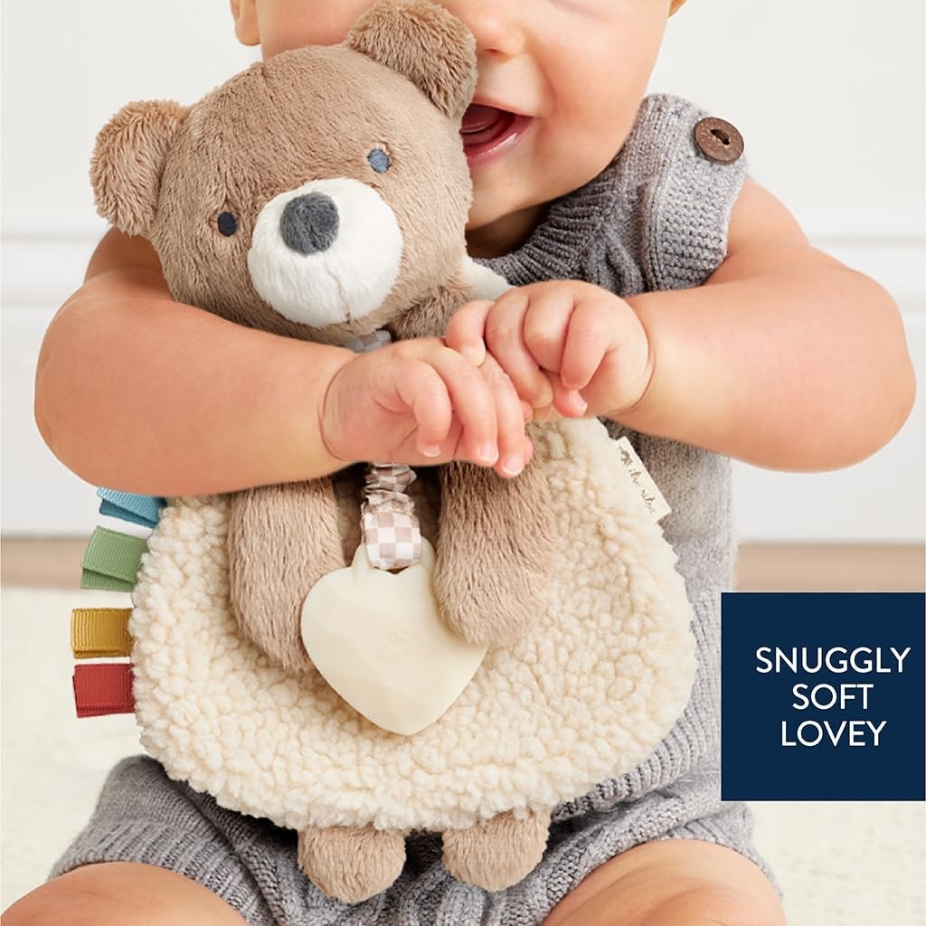 image:imageItzy Ritzy Itzy Lovey Including Teether Baby Lovey with Teether Textured Ribbons amp Dangle Arms Features Crinkle Sound Sherpa Fabric and Minky Plush BearBear