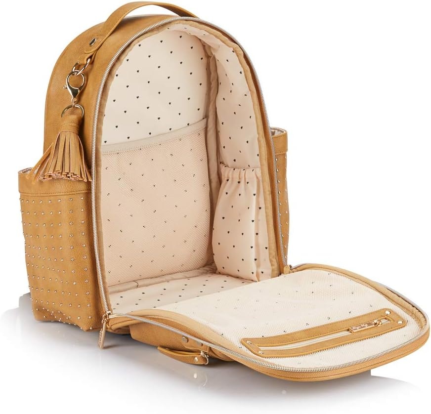 image:imageChelsea Cole for Itzy Ritzy Mini Diaper Bag Backpack Studded Mini Backpack with Changing Pad 8 Pockets Rubber Feet amp Tassel Caramel with Sweetheart Print Interior and Gold Hardware