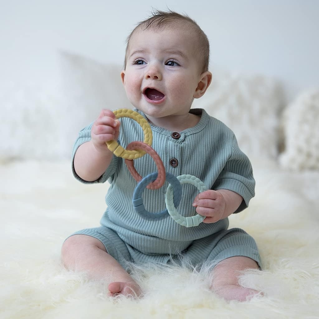 image:imageItzy Ritzy Linking Ring Set Set of 8 Braided RainbowColored Versatile Linking Rings Attach to Babys Car Seat Stroller amp Activity Gym to Keep Toys Nearby RainbowRainbow