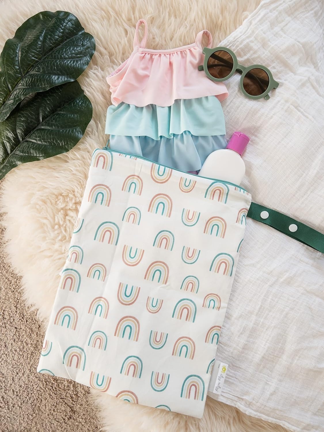 image:imageItzy Ritzy Sealed Wet Bag with Handle Designed for Travel Swimsuits Cloth Diapers Gym Clothes amp Toiletries Washable amp Reusable with Water Resistant Lining Over The Rainbow