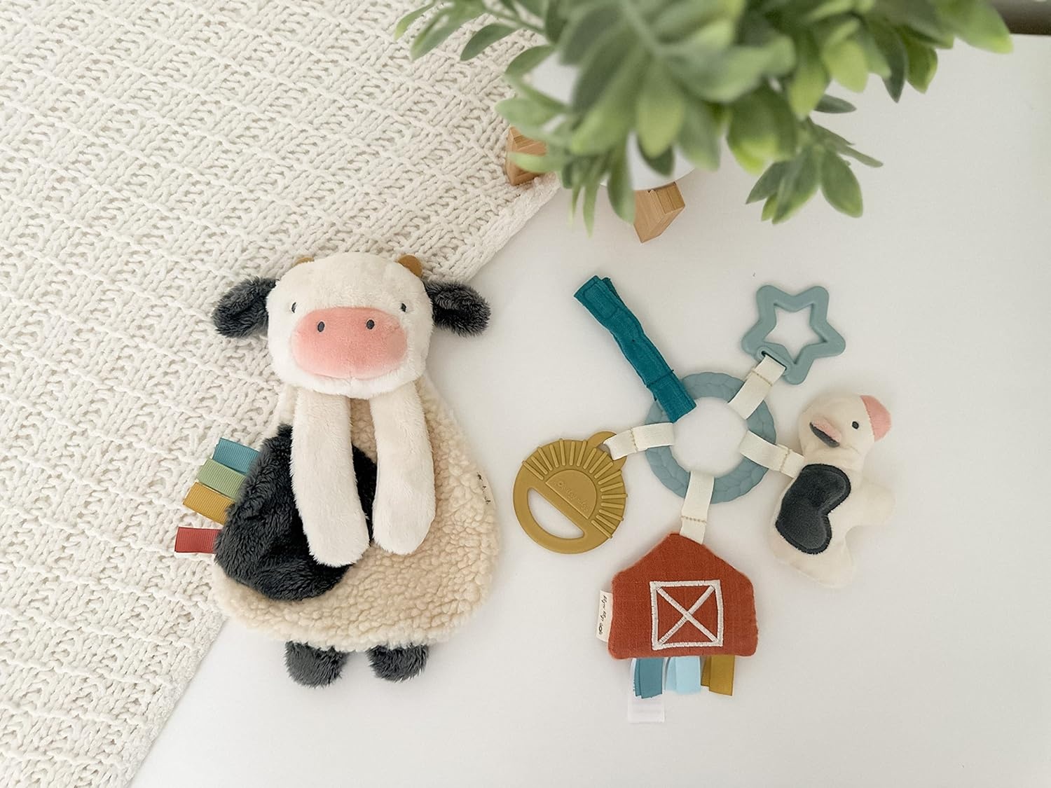 image:imageItzy Ritzy Teething Toy Gift Set Includes Cow Lovey amp BarnThemed Busy Ring Car Seat and Stroller Toy Features Crinkle Sounds Engaging Textures amp Silicone Teething Relief FarmFarm