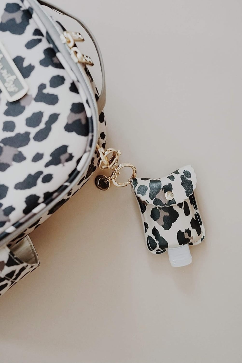 image:imageItzy Ritzy Hand Sanitizer Holder Hand Sanitizer Case Keychain Fits 2Ounce Bottles of Sanitizers Not Included Clips to Diaper Bag Purse or Travel Bag Leopard