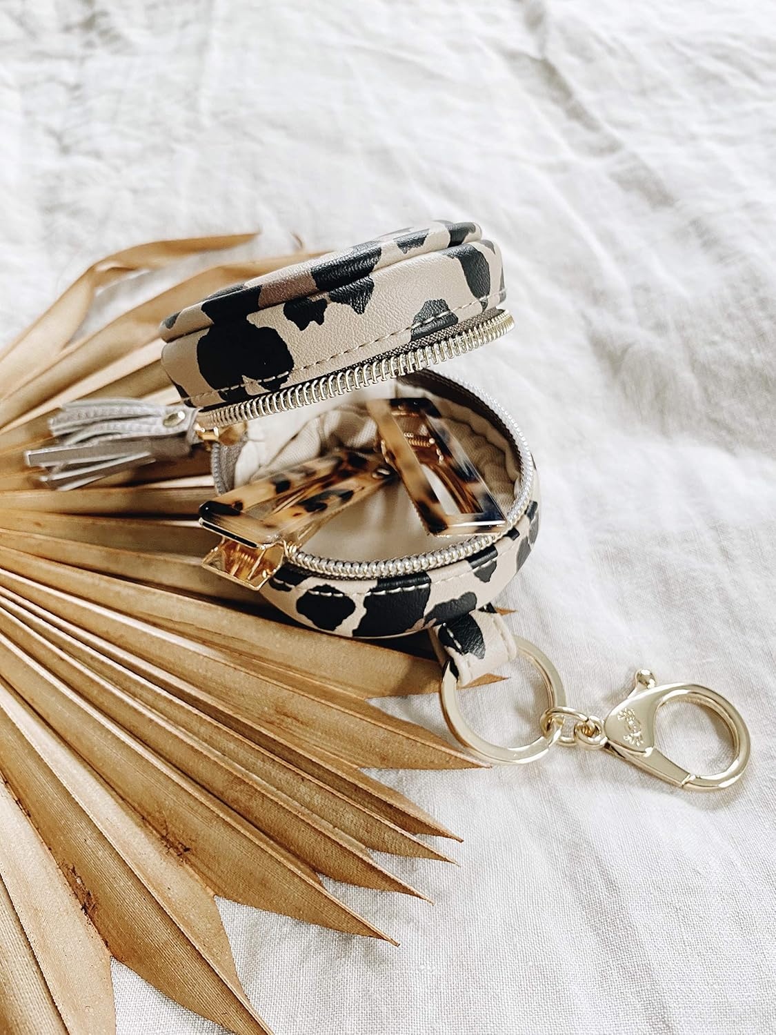 image:imageItzy Ritzy Pacifier Holder Case with Clip Pacifier Case Includes Clasp to Easily Attach to a Diaper Bag or Purse Measures 25 in Diameter and Holds 2 Pacifiers Milk amp HoneyLeopard
