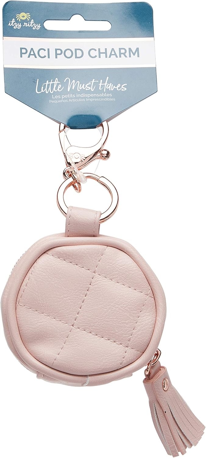 image:imageItzy Ritzy Pacifier Holder Case with Clip Pacifier Case Includes Clasp to Easily Attach to a Diaper Bag or Purse Measures 25 in Diameter and Holds 2 Pacifiers Milk amp HoneyBlush