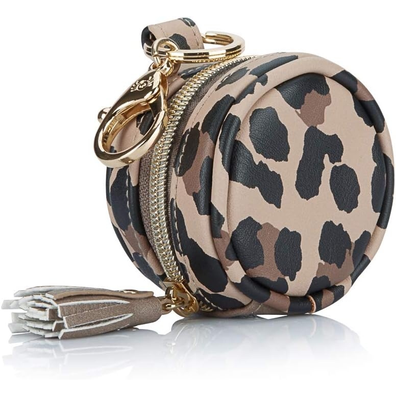 image:imageItzy Ritzy Pacifier Holder Case with Clip Pacifier Case Includes Clasp to Easily Attach to a Diaper Bag or Purse Measures 25 in Diameter and Holds 2 Pacifiers Milk amp HoneyLeopard