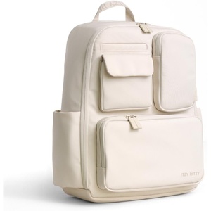 image:imageItzy Ritzy Utility Diaper Bag Backpack  Features 17 Pockets Including 2 Insulated Bottle Holders amp Trolley Sleeve and Includes Stroller Straps amp Changing Pad  Part of the Belong Collection GreenCream